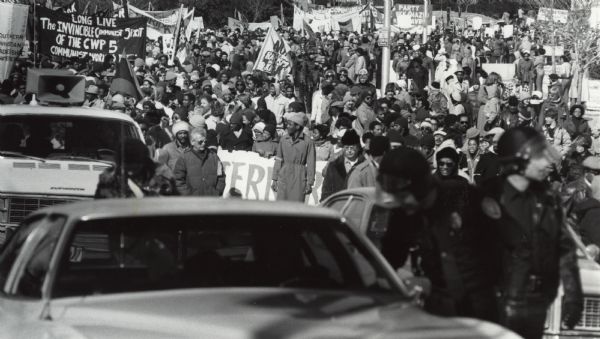 Protest march called in response to the murder of five activists, labor organizers, and members of the Communists Workers Party by the Ku Klux Klan (KKK) on November 3, 1979.