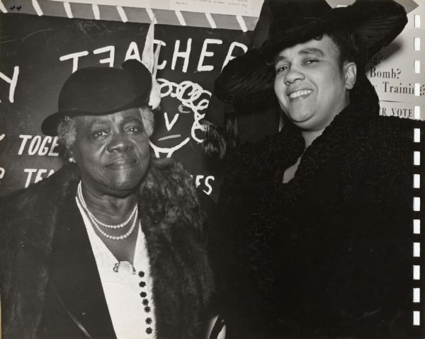 Mary McLeod Bethune (left), noted educator and civil rights leader, at the annual convention of the Southern Conference for Human Rights.  The woman to her right is unidentified.