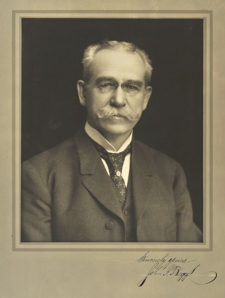 Quarter-length portrait of John J. Beggs, Milwaukee public utilities executive.