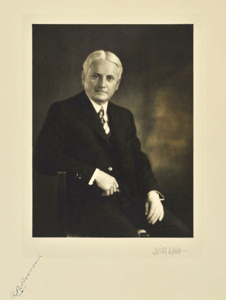 Waist-up seated portrait of Rezeau Blanchard Brown, Milwaukee public utility executive.