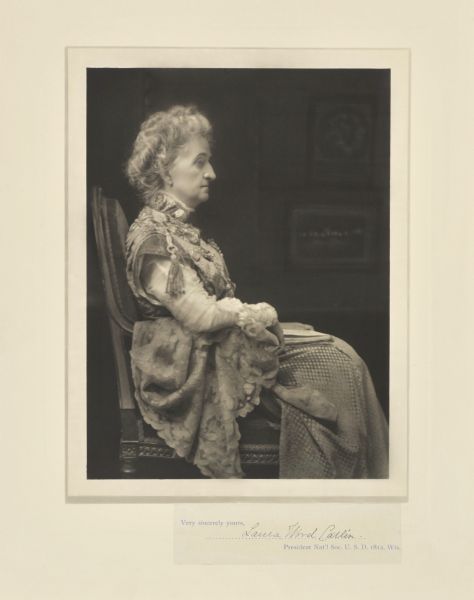 Seated profile portrait of Laura Wood Catlin (Mrs. Charles), founder and president of Milwaukee Children's Free Hospital.