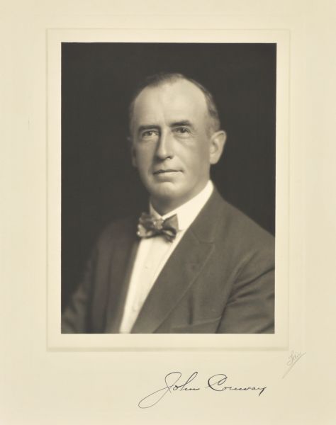 Quarter-length studio portrait of John Conway, Appleton hotel owner.