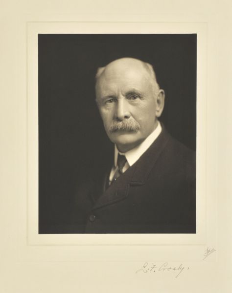 Quarter-length studio portrait of Luther Fairfield Crosby, Milwaukee carpenter.