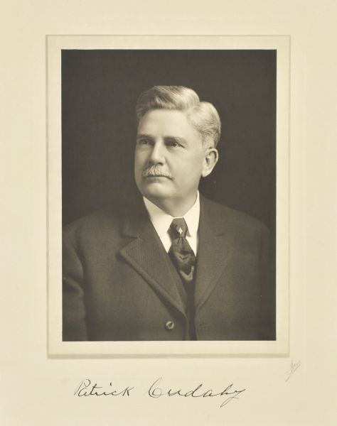 Quarter-length studio portrait of Patrick Cudahy, Milwaukee meat packer; younger.