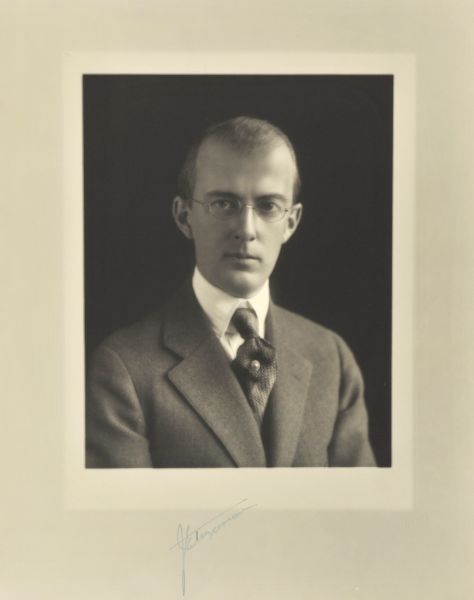 Quarter-length studio portrait of J.E. Fitzgibbon, Milwaukee company vice-president.