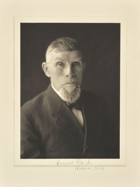 Quarter-length studio portrait of Conrad Fox, Sr., Racine farmer and manufacturer.
