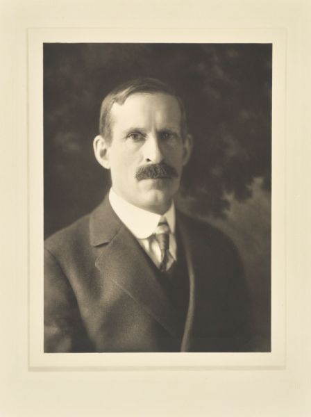 Quarter-length studio portrait of Charles Freeman, Racine manufacturer.