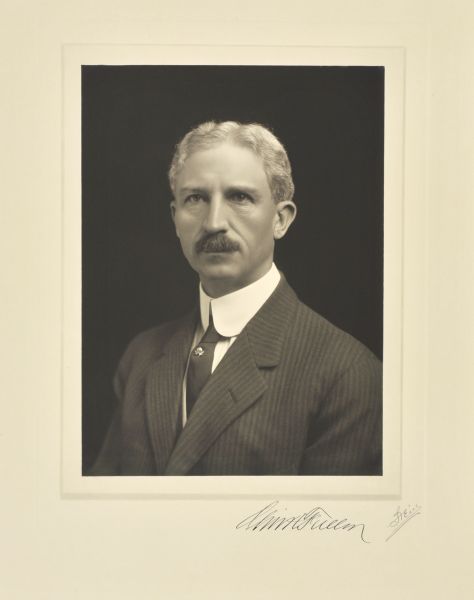 Quarter-length studio portrait of Oliver Clyde Fuller, Milwaukee banker.