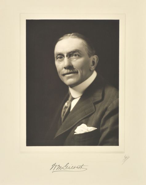 Quarter-length studio portrait of W.M. Gilbert, Neenah manufacturer and banker.