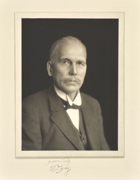 Quarter-length studio portrait of W.D. Gray, Milwaukee engineer.