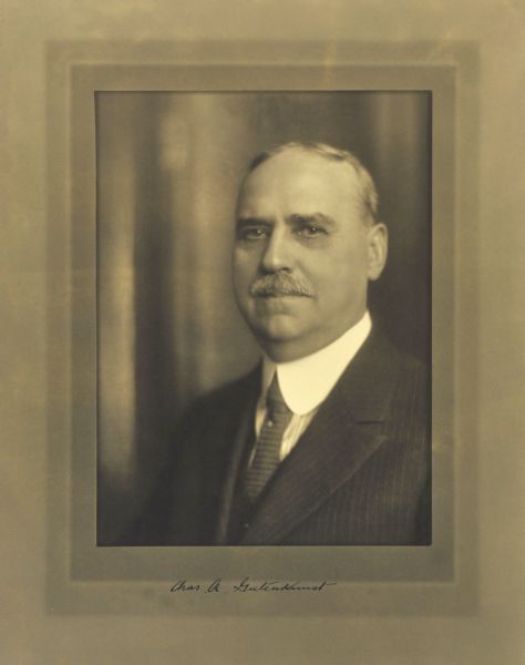 Quarter-length studio portrait of Charles A. Gutenkunst, Milwaukee company president.