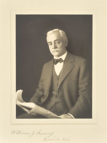 Waist-up studio portrait of William Harvey, Racine manufacturer.