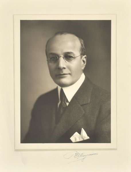 Quarter-length studio portrait of Robert G. Hayssen, Milwaukee manufacturer.