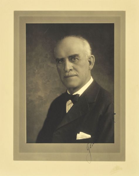 Quarter-length studio portrait of John Hoff, Milwaukee ice dealer.