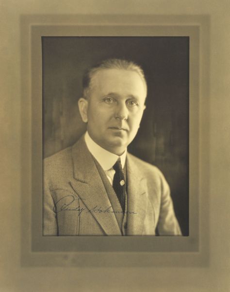 Quarter-length studio portrait of Rudolph Hokanson, Milwaukee automobile distributor.