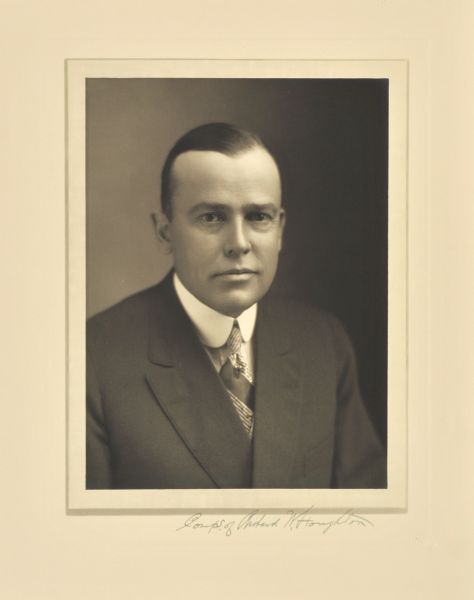 Quarter-length studio portrait of Richard W. Houghton, Milwaukee lumberman and realtor.