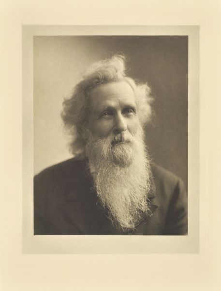 Quarter-length studio portrait of John M. Howell.