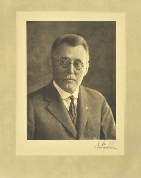 Quarter-length studio portrait of William P. Jobse, Milwaukee physician.