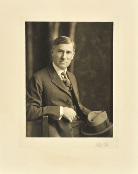 Waist-up seated studio portrait of Edward James Kearney, Milwaukee engineer.