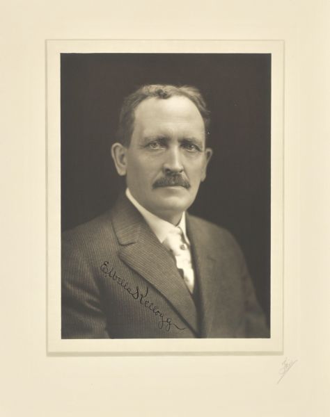 Quarter-length studio portrait of E. Wells Kellogg, Milwaukee physician and surgeon.