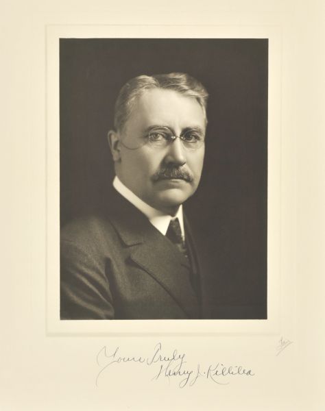 Quarter-length studio portrait of Henry J. Killilea, Milwaukee attorney.