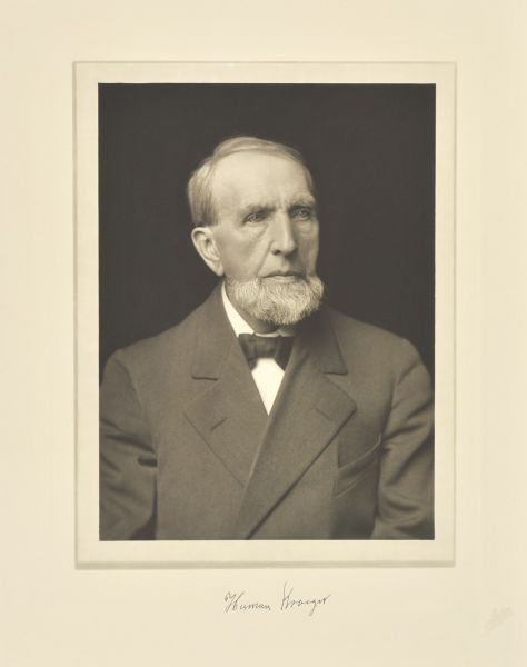 Quarter-length studio portrait of Herman Kroeger, Milwaukee merchant.