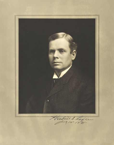 Quarter-length studio portrait of Herbert N. Laflin, Milwaukee lawyer.