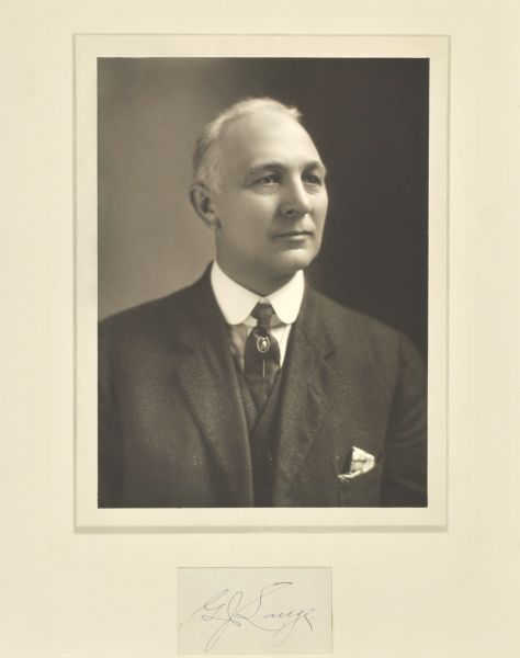 Quarter-length studio portrait of Gustav J. Lange, Eau Claire businessman.