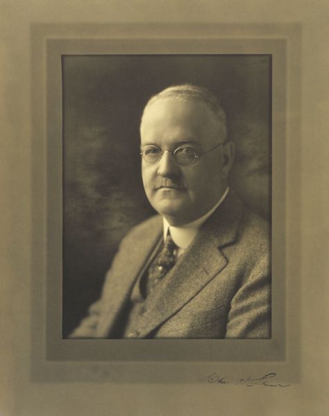 Quarter-length studio portrait of Charles Henry Lemon, Milwaukee physician and surgeon.