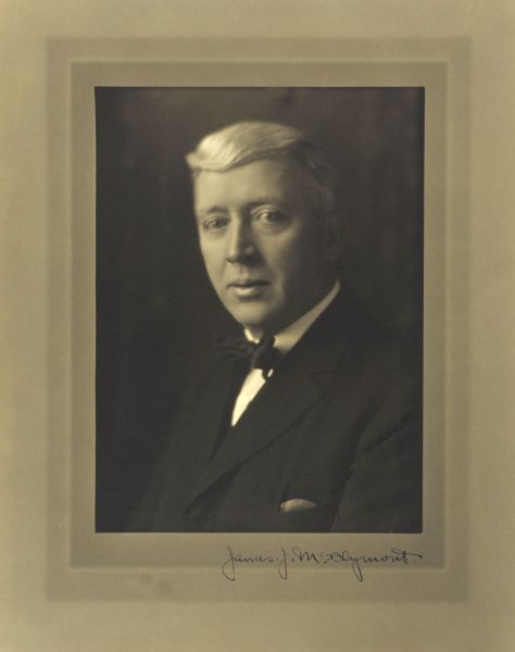 Quarter-length studio portrait of James J. McClymont, Milwaukee company president.