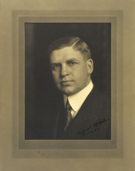 Quarter-length studio portrait of Clifford L. McMillen, Milwaukee businessman.