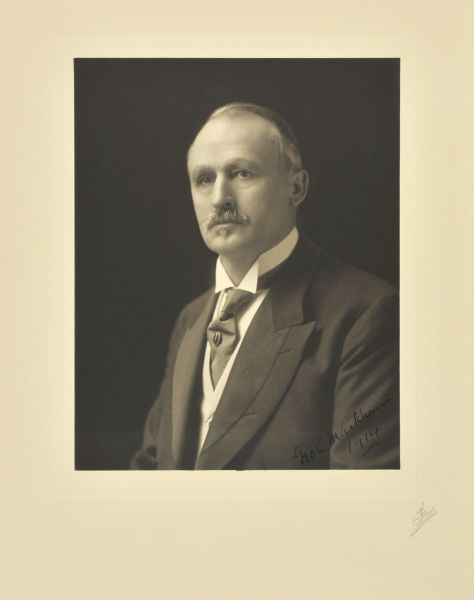Quarter-length studio portrait of George C. Markham, Milwaukee lawyer and company president.