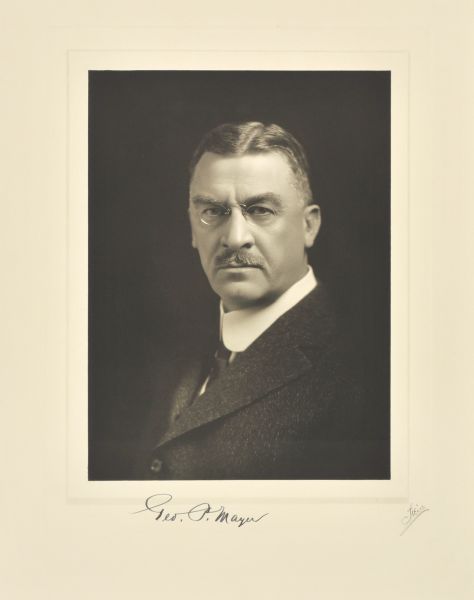 Quarter-length studio portrait of George P. Mayer, Milwaukee manufacturer.