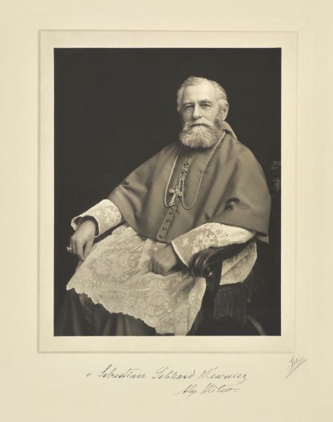Three-quarter length seated studio portrait of Sebastian Gebhard Messmer, Milwaukee Archbishop.