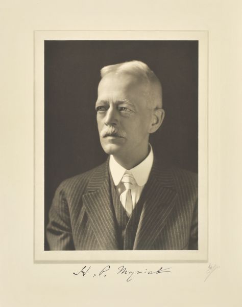 Quarter-length studio portrait of Harry Pierce Myrick, Milwaukee newspaperman.