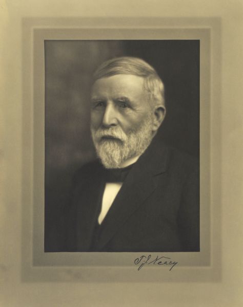 Quarter-length studio portrait of Thomas J. Neacy, Milwaukee manufacturer.