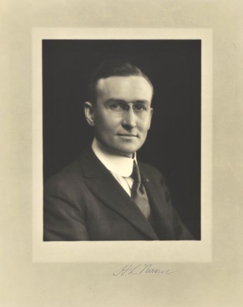 Quarter-length studio portrait of Henry L. Nunn, Milwaukee manufacturer.