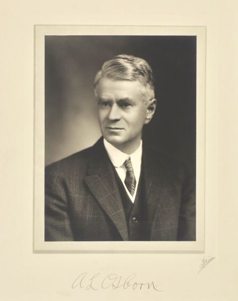 Quarter-length studio portrait of Albert L. Osborn, Oshkosh lumberman.