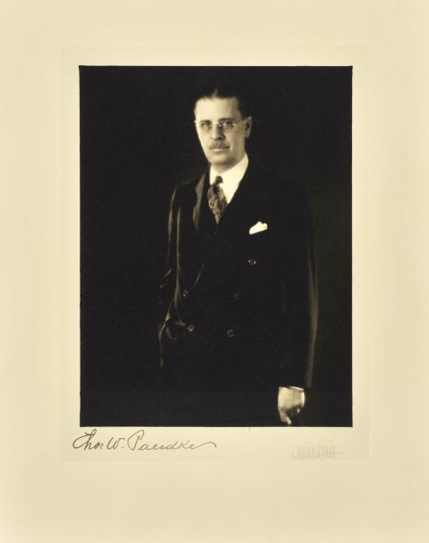 Three-quarter length studio portrait of Charles A. Paeschke, Milwaukee company president.