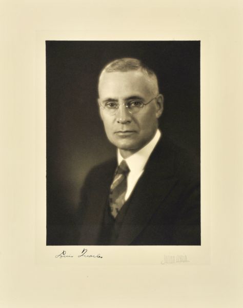 Quarter-length studio portrait of Louis Quarles, Milwaukee lawyer.