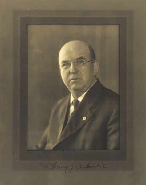 Quarter-length studio portrait of Henry J. Schouten, West Allis company president.