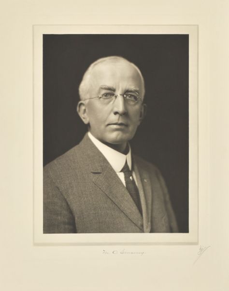 Quarter-length studio portrait of Martin O. Senseny, Racine company president.