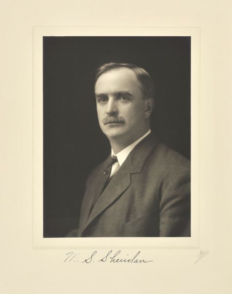 Quarter-length studio portrait of Michael S. Sheridan, Milwaukee judge.
