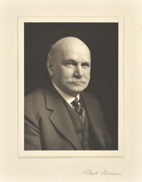 Quarter-length studio portrait of Albert Slocum, Milwaukee manufacturer.