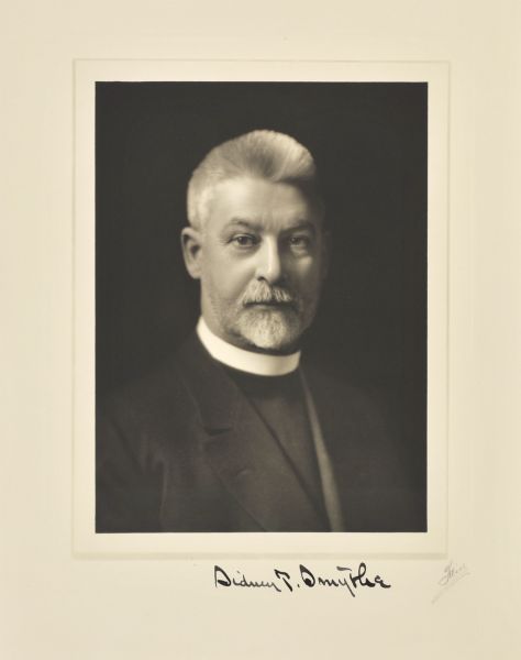 Quarter-length studio portrait of Sidney T. Smythe, Delafield clergyman and educator.