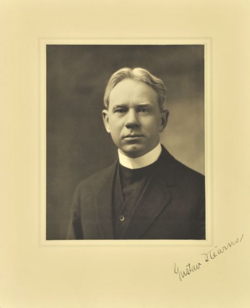 Quarter-length studio portrait of Reverend Gustav Stearns, Milwaukee pastor.