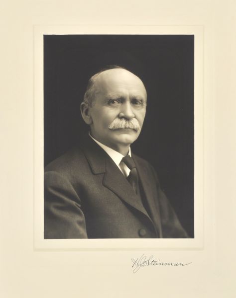 Quarter-length studio portrait of Henry J. Steinman, Milwaukee merchant.