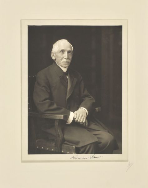 Waist-up seated studio portrait of Hermann Stern, Milwaukee merchant.