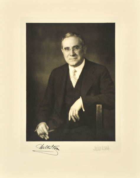 Waist-up seated studio portrait of Walter Stern, Milwaukee company president.