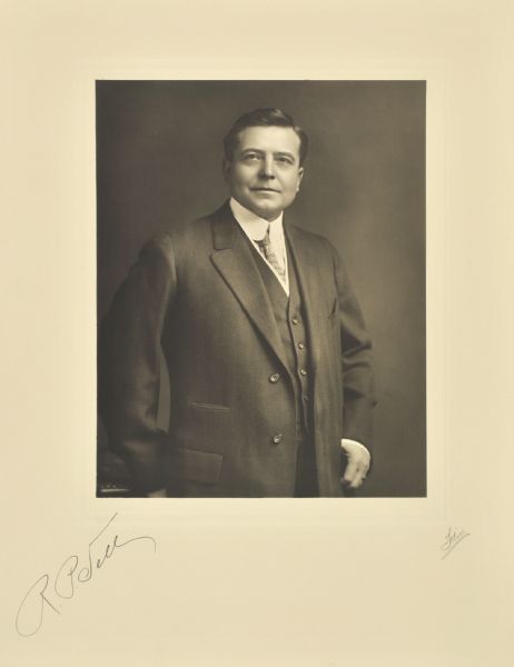 Three-quarter length studio portrait of Richard P. Tell, Milwaukee company manager.